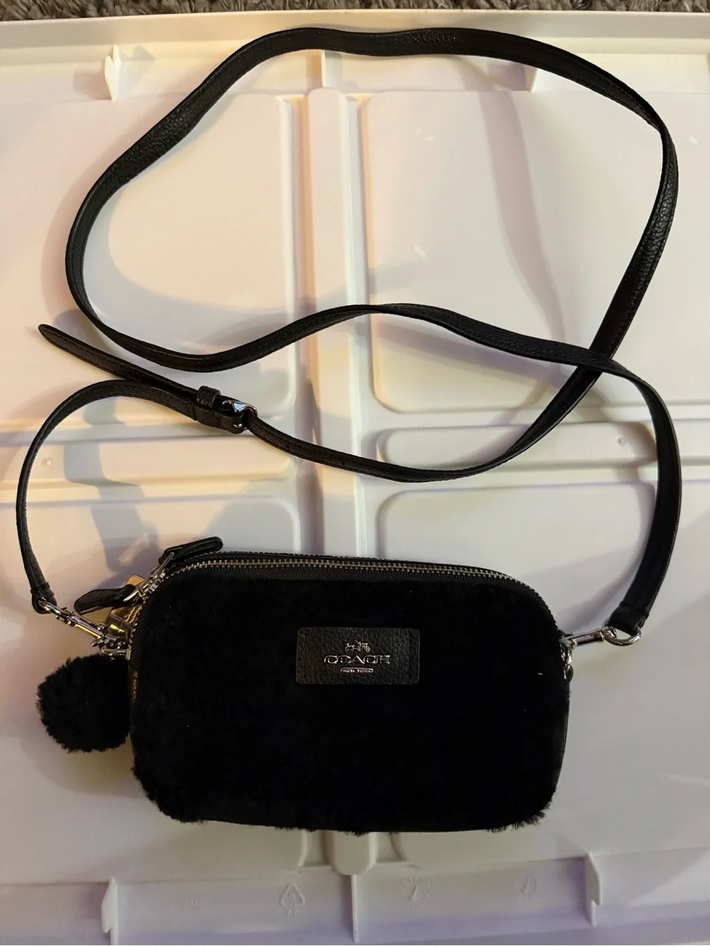 COACH Black Fuzzy Crossbody with Pom Charm and Leather Strap